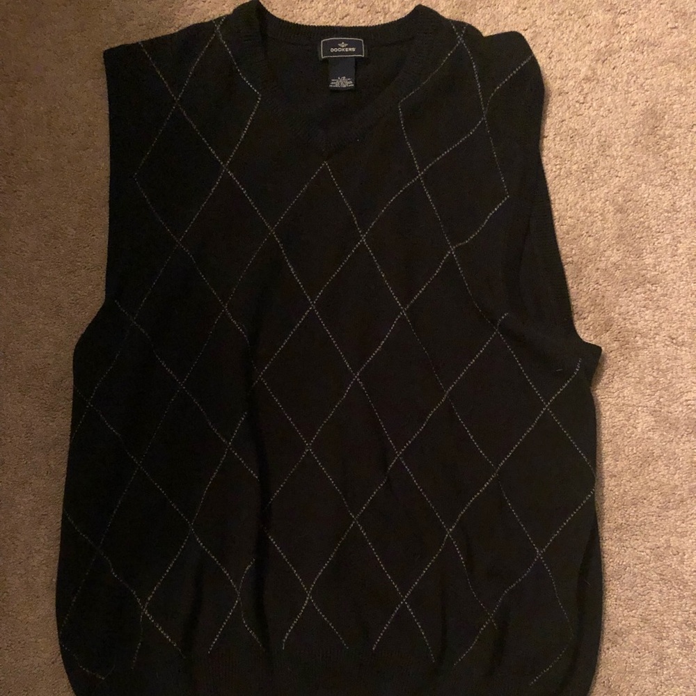 This sweater vest is size Large.